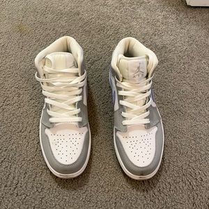 Women’s Air Jordan’s- grey and light blue/purple. I have worn them once.